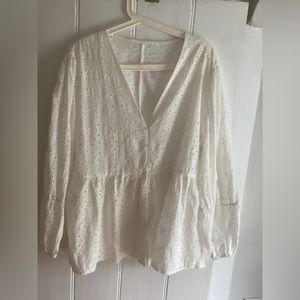White eyelet cotton peplum long sleeve top